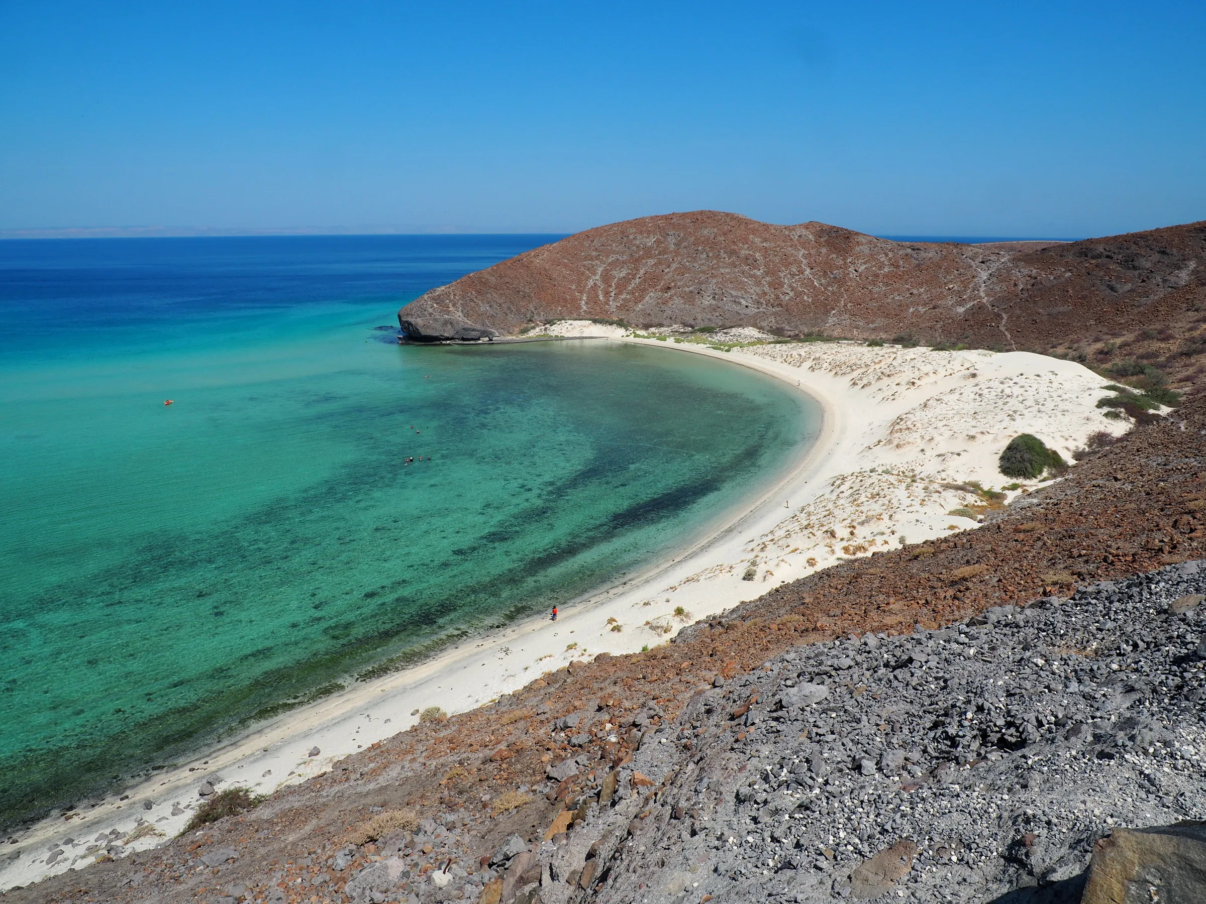 Aerial view of Balandra Beach, its turquoise bay, white sand and desert hills